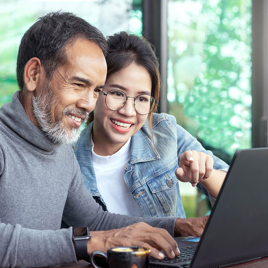 Couple looking at computer